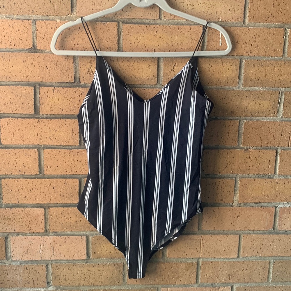 Gaze size small body suit with button snaps, never worn